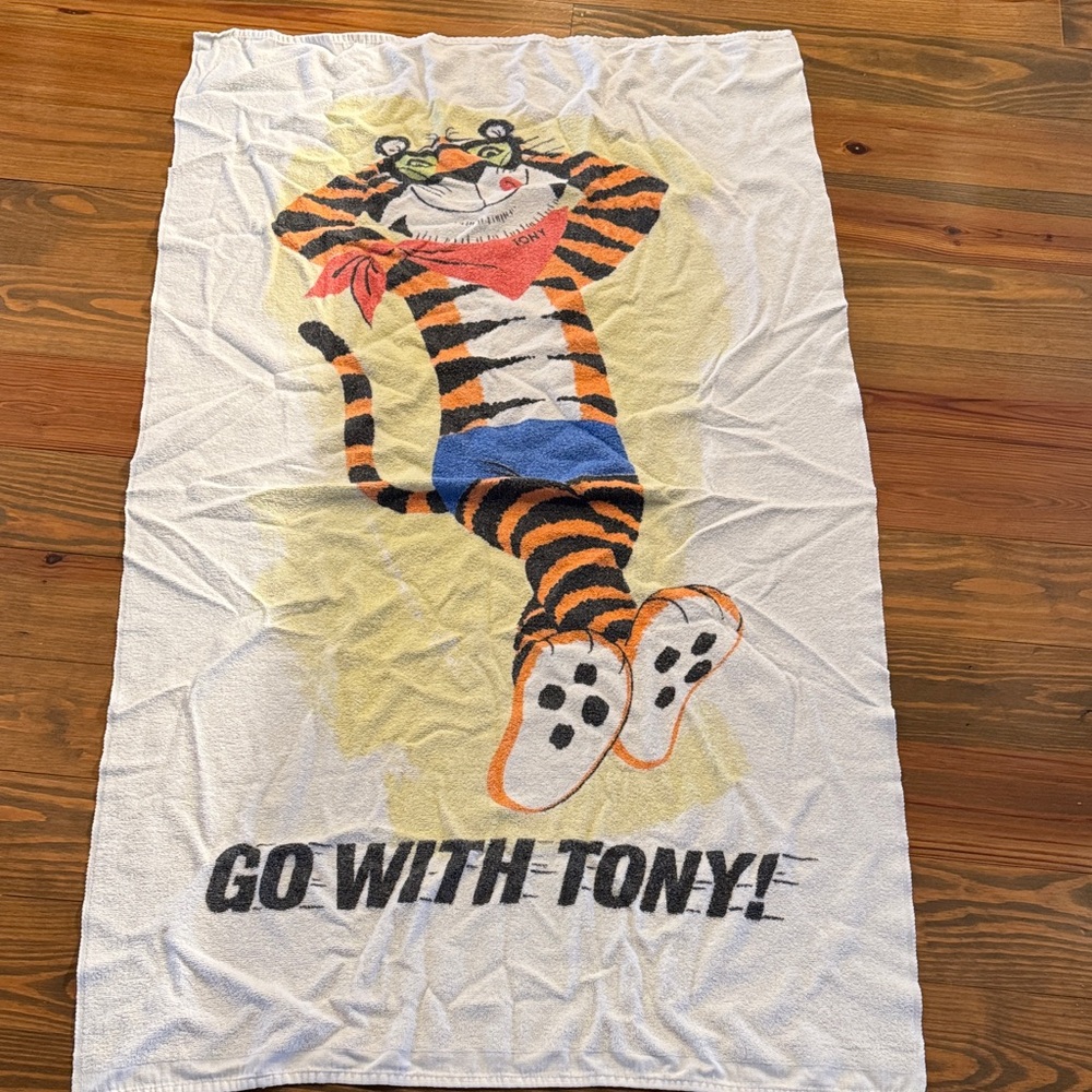 Kellogg Tony the Tiger towel vintage, fabric is thinner than typical towels.